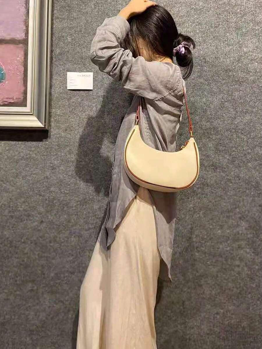Sac à bandoulière en cuir avec grande capacité et design épuré