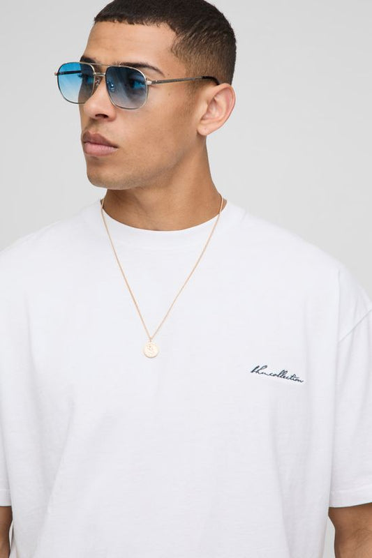 boohooMAN - T-shirt ample à imprimé abstrait de feuille