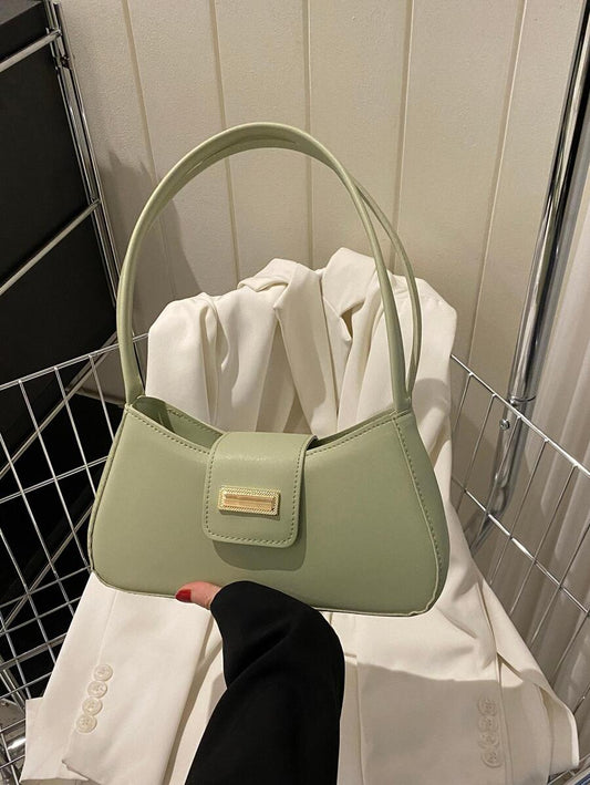 Sac à bandoulière en métal avec fermeture éclair et design épuré