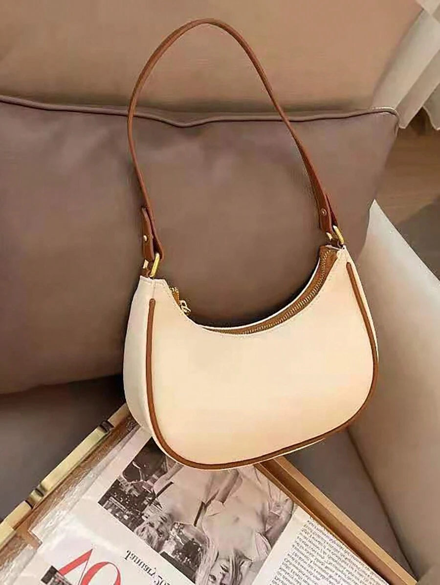 Sac à bandoulière en cuir avec grande capacité et design épuré