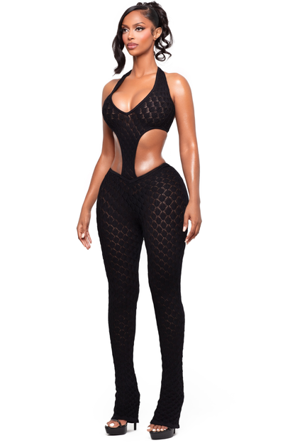 Bachina – Jumpsuit en maille avec décolleté plongeant et coupe ajustée