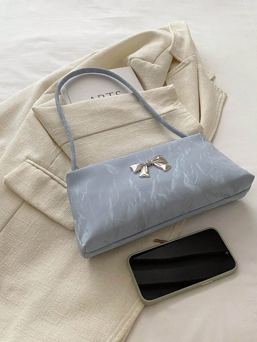 Sac sous le bras – Forme carrée, nœud décoratif, anse courte