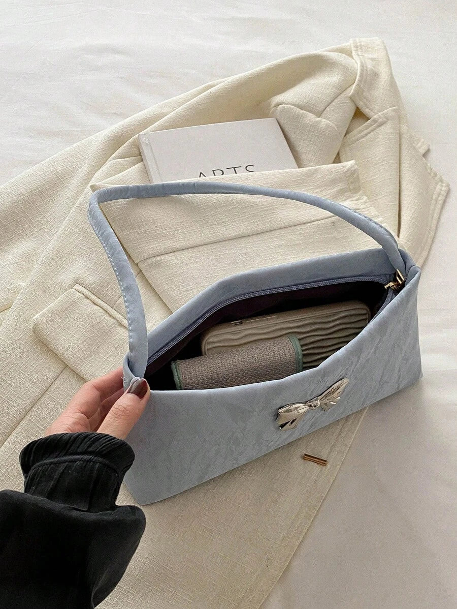 Sac sous le bras – Forme carrée, nœud décoratif, anse courte