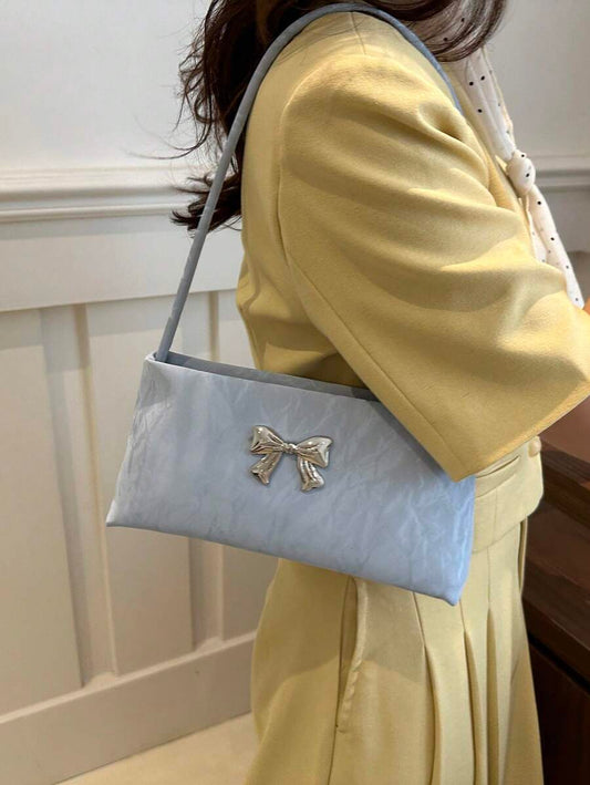 Sac sous le bras – Forme carrée, nœud décoratif, anse courte