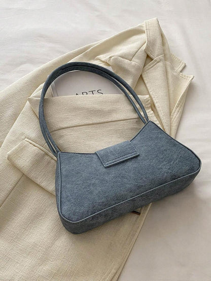 Sac à bandoulière en métal avec fermeture éclair et design épuré