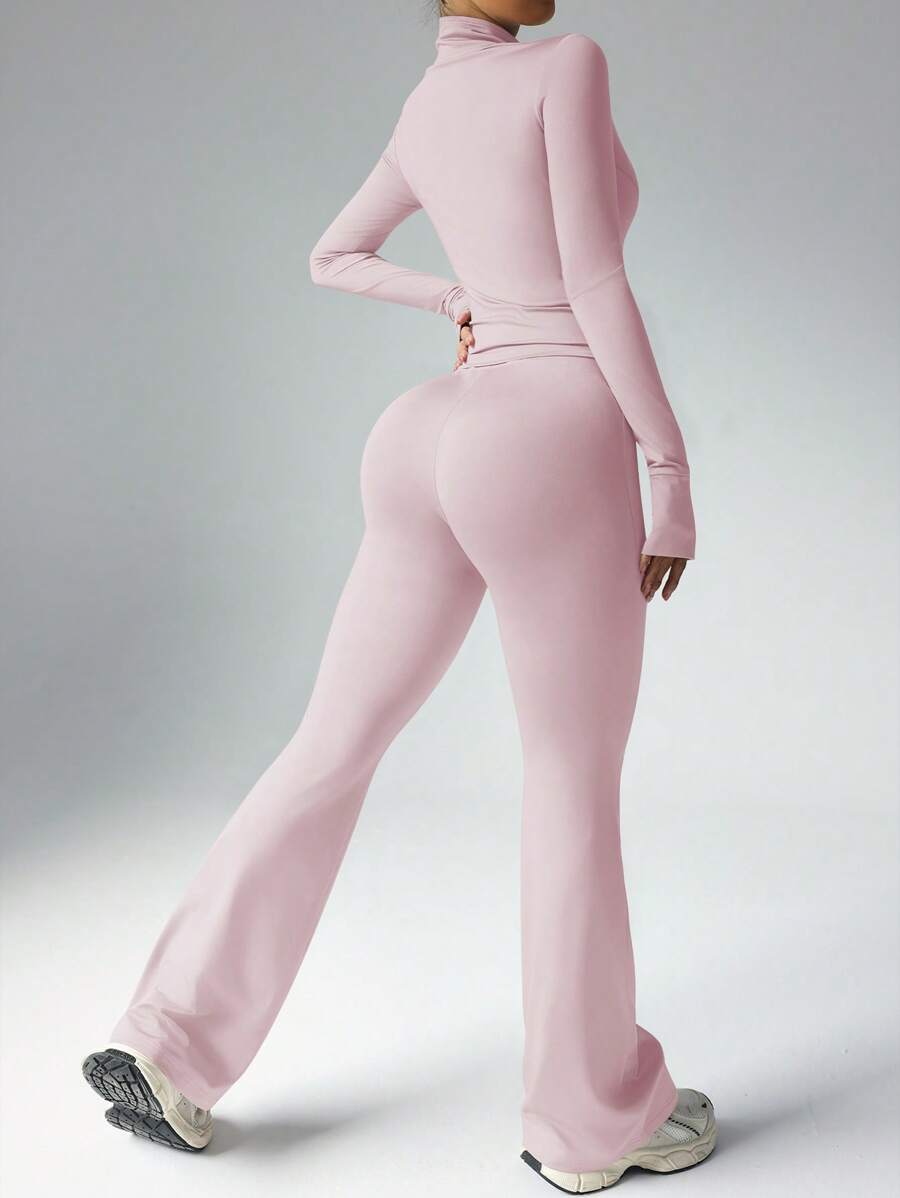 Dewbera – Ensemble de sport à manches longues et pantalon évasé, conçu pour le confort et la liberté de mouvement.