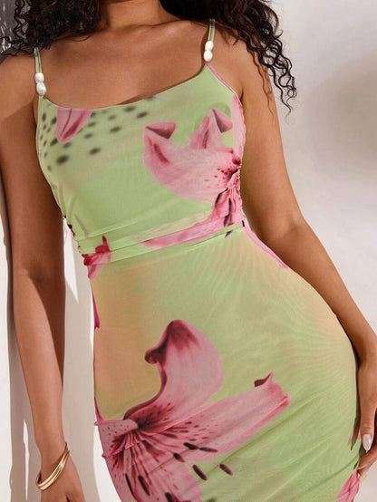 Opulessa – Robe mini imprimée avec lanières de perles et coupe estivale