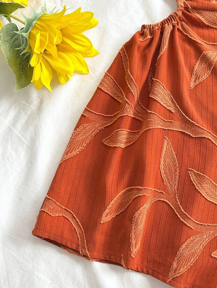 Soleia – Combi-short ample à dos nu avec liens et découpes à la taille