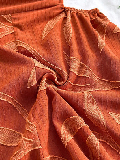 Soleia – Combi-short ample à dos nu avec liens et découpes à la taille