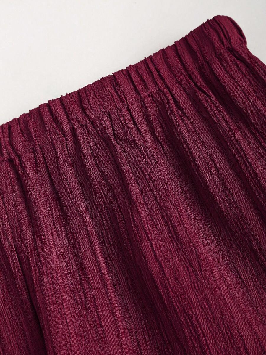 Sweetra – Ensemble 2 pièces avec top buste dégagé et pantalon ample à jambes larges