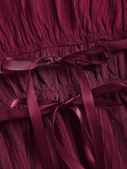 Sweetra – Ensemble 2 pièces avec top buste dégagé et pantalon ample à jambes larges