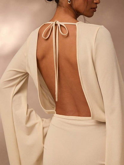 Glamine – Robe courte ample avec laçage à la taille et effet métallique