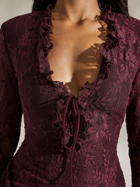 Opulessa – Robe mini moulante dos nu en tricot à col ras-du-cou