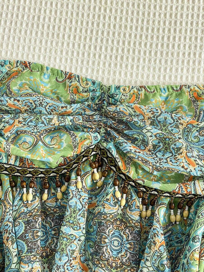 Flirla – Blouse en chiffon à lien taille unique et ourlet asymétrique