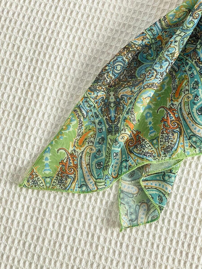 Flirla – Blouse en chiffon à lien taille unique et ourlet asymétrique