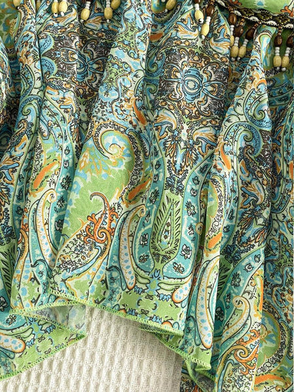 Flirla – Blouse en chiffon à lien taille unique et ourlet asymétrique