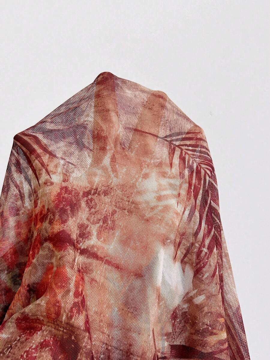 Soleia – Robe mini dos nu à franges et perles métalliques
