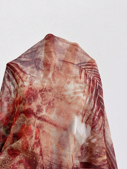 Soleia – Robe mini dos nu à franges et perles métalliques