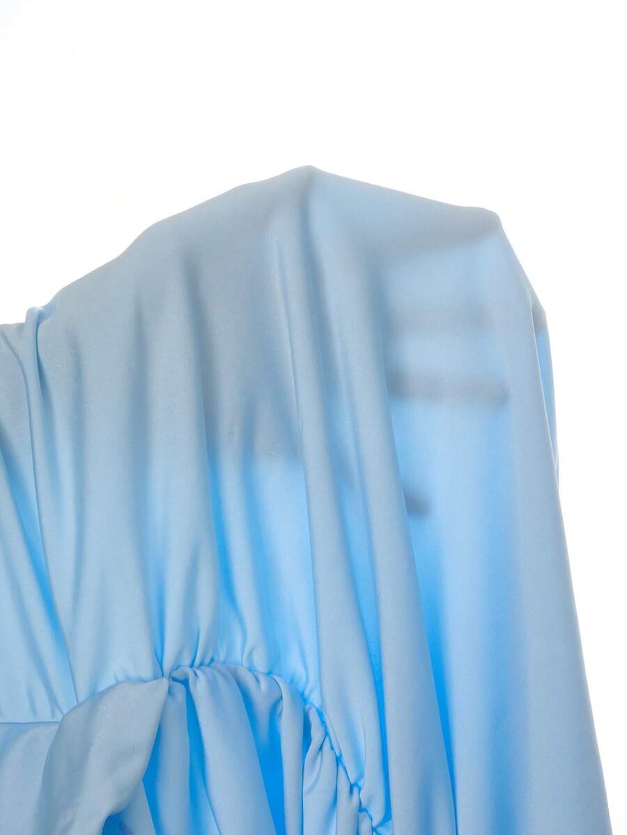 Sixtylia – Robe mini moulante à encolure ras-du-cou et dos nu drapé