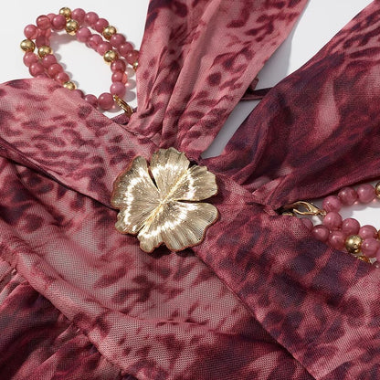 ZARA – Robe en métal décorée avec design léopard et coupe ajustée