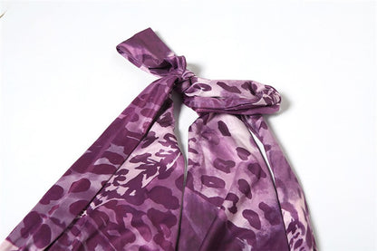 Furite – Robe en métal décorée avec design léopard et coupe ajustée