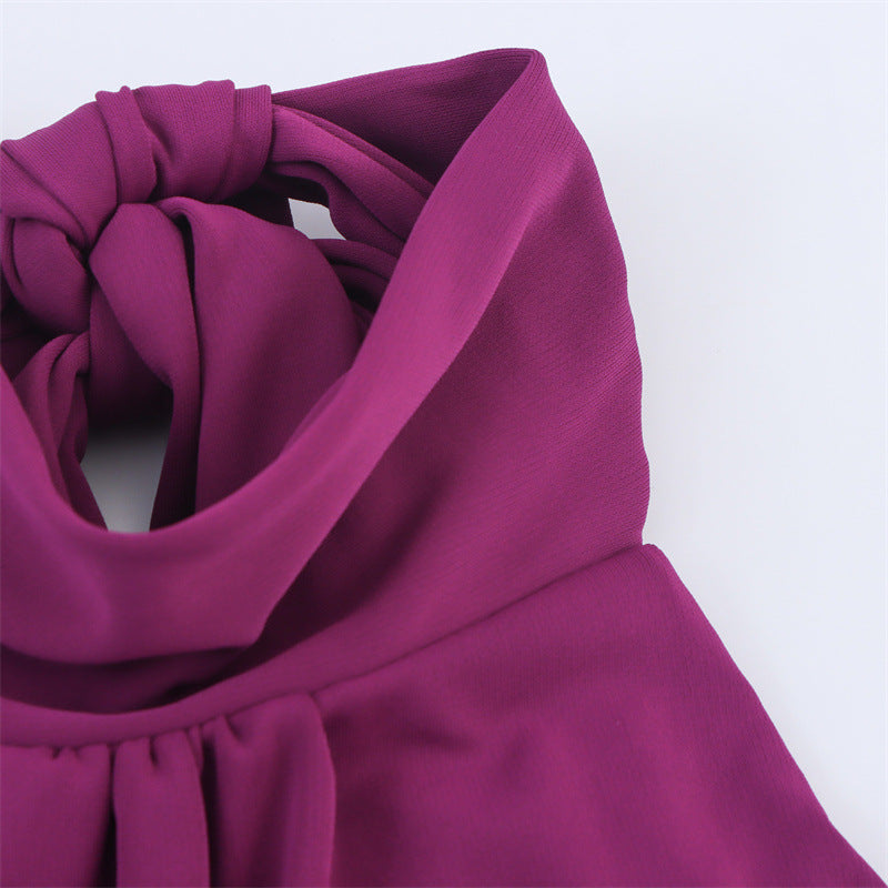 ATY – Robe moulante à décolleté halter et détails plissés