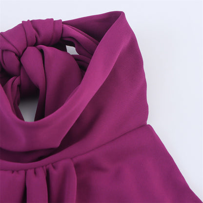 ATY – Robe moulante à décolleté halter et détails plissés