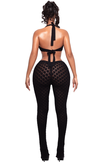 Bachina – Jumpsuit en maille avec décolleté plongeant et coupe ajustée